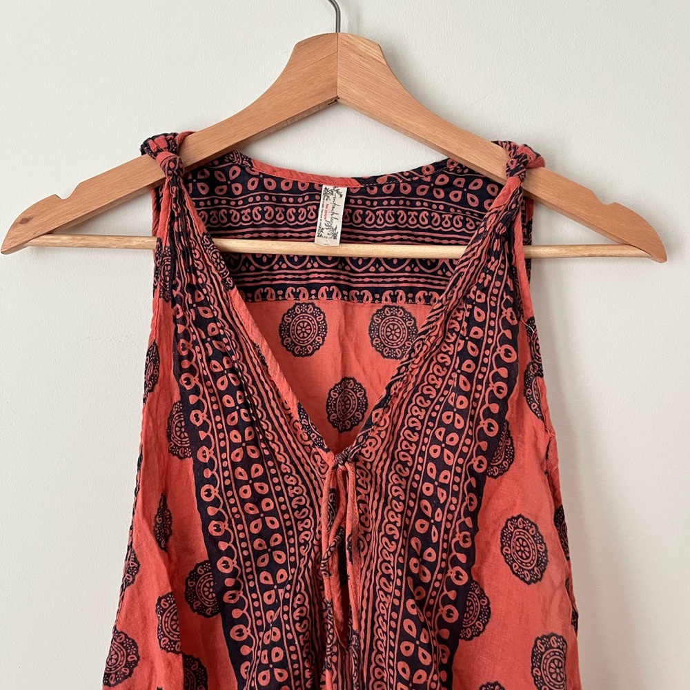Free People boho tribal themed bodysuit in coral and navy blue (XS)
